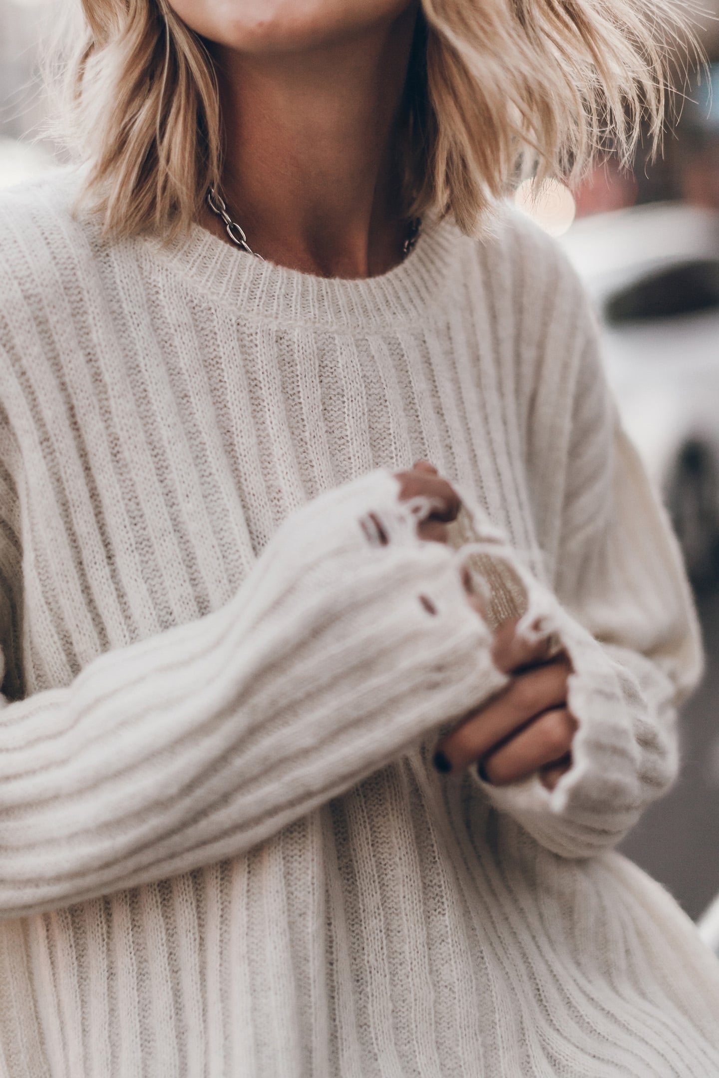 THE OFF WHITE DESTROYED KNITTED SWEATER 3