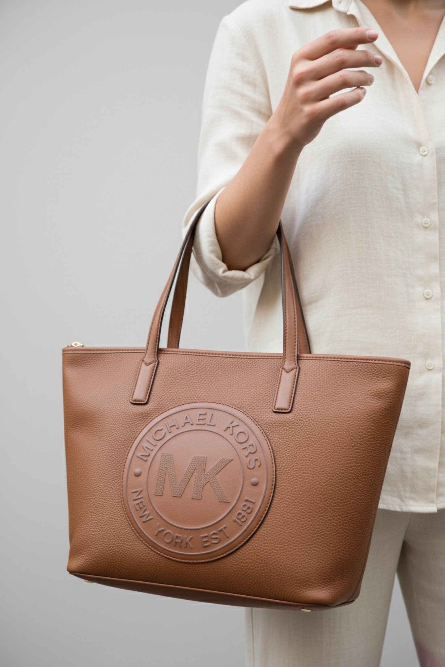 MEDIUM LEATHER TOP ZIP BUCKET MESSENGER BAG IN BROWN 1