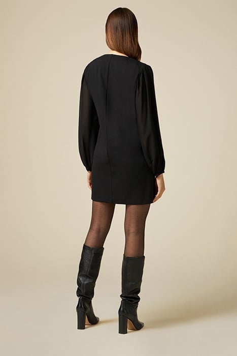 Dual-material dress with brooch 2