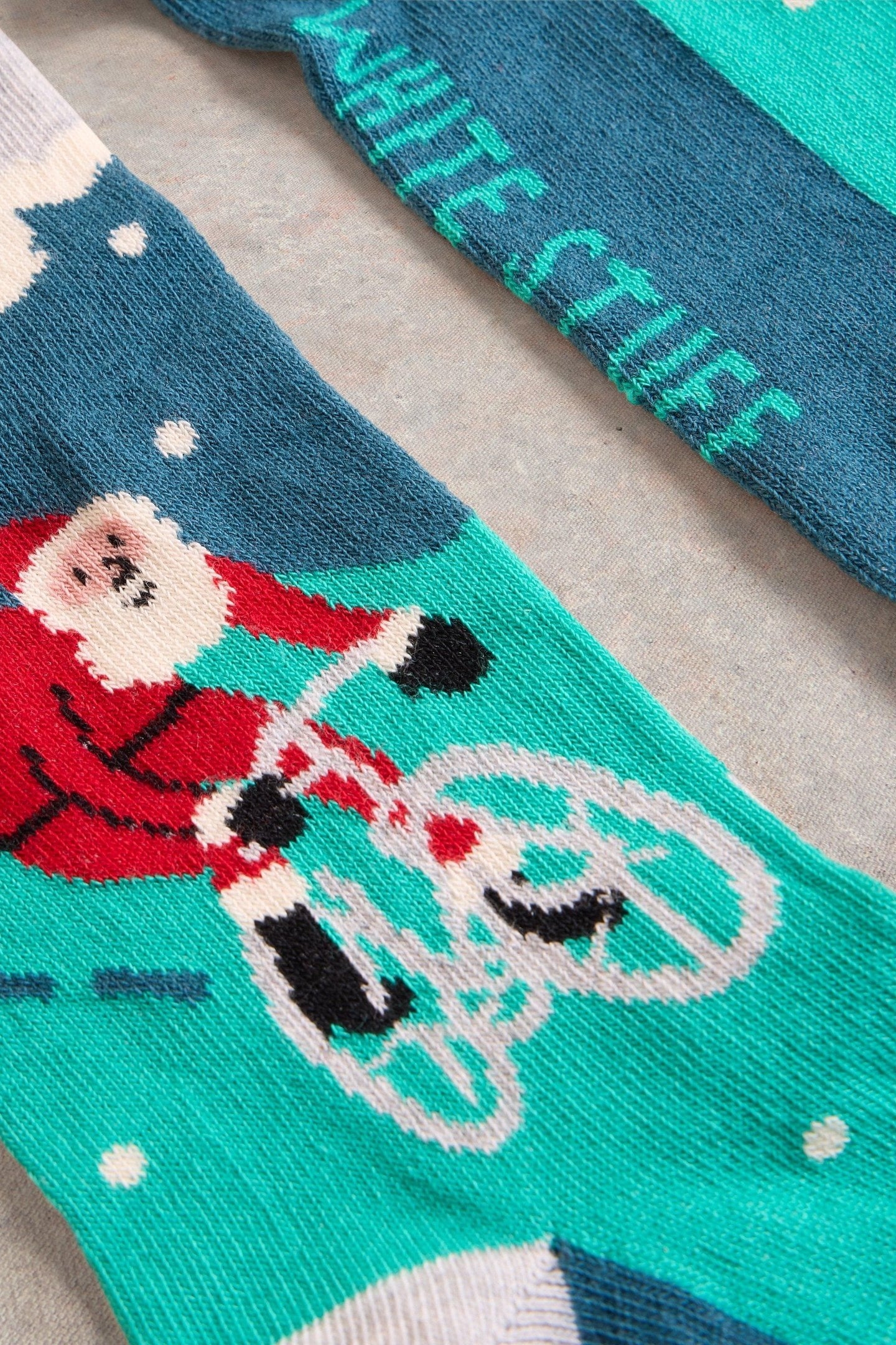 CYCLING SANTA IN A CRACKER TEAL MULTI 3